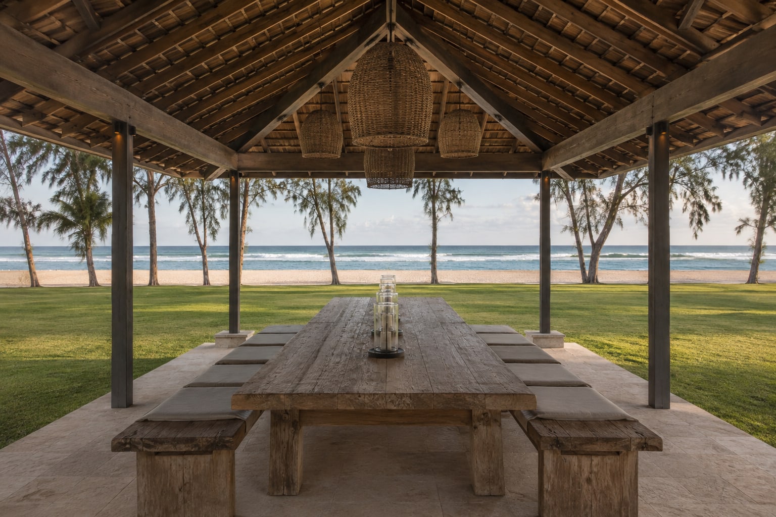 Shaded timber dining pavilion facing the surf break